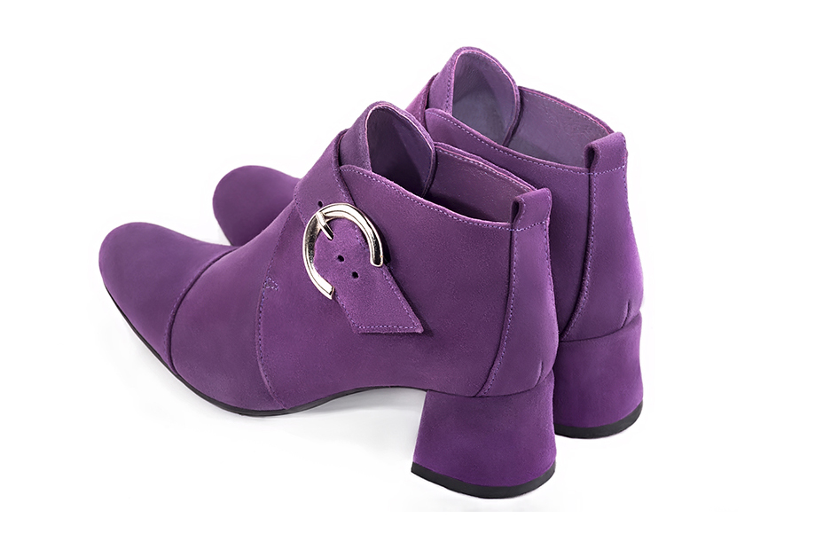 Amethyst purple women's ankle boots with buckles at the front. Round toe. Low flare heels. Rear view - Florence KOOIJMAN